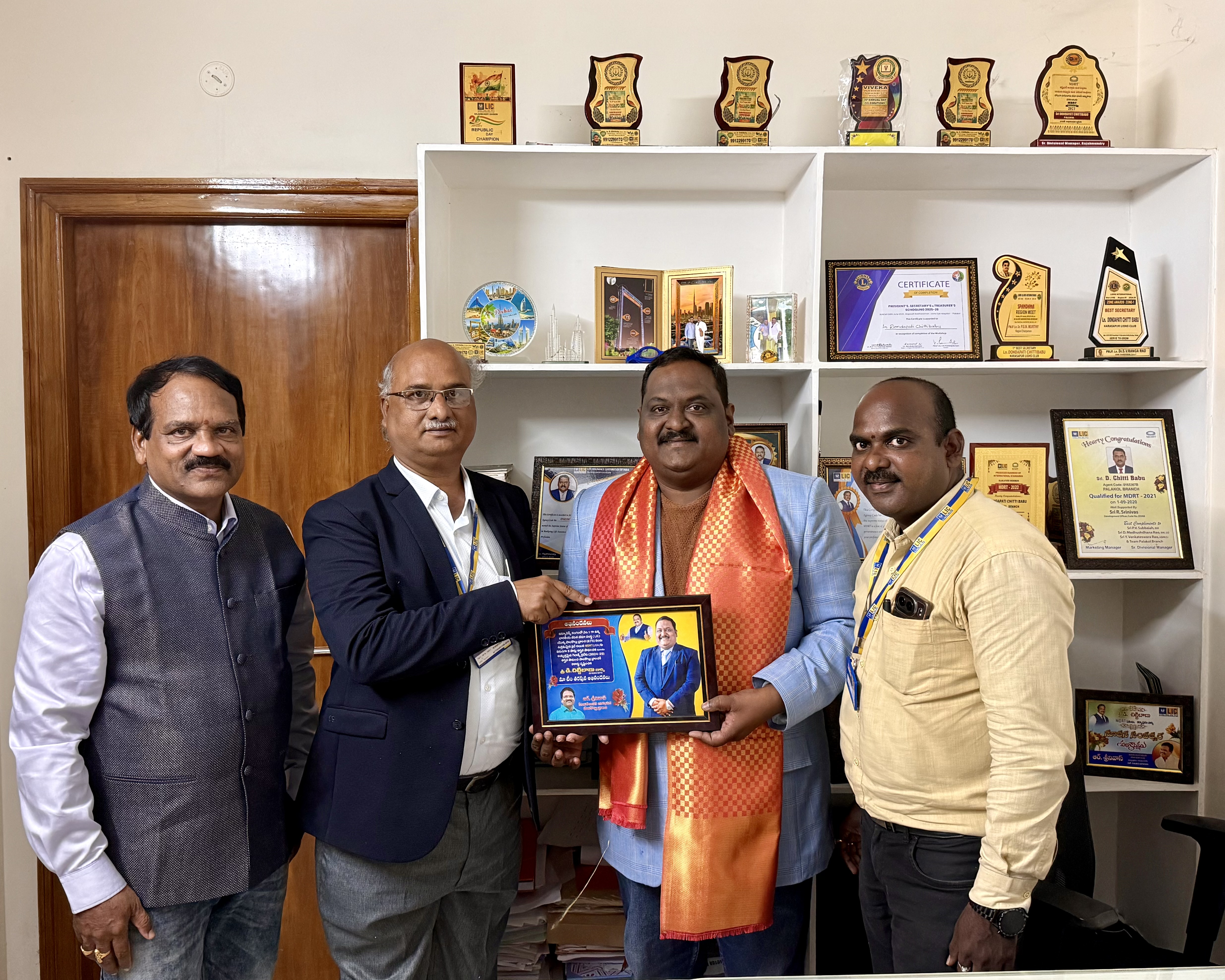 D. Chittibabu receiving award